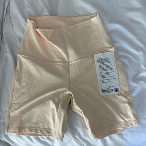 Lululemon Women's light yellow shorts in the color “butter cream”